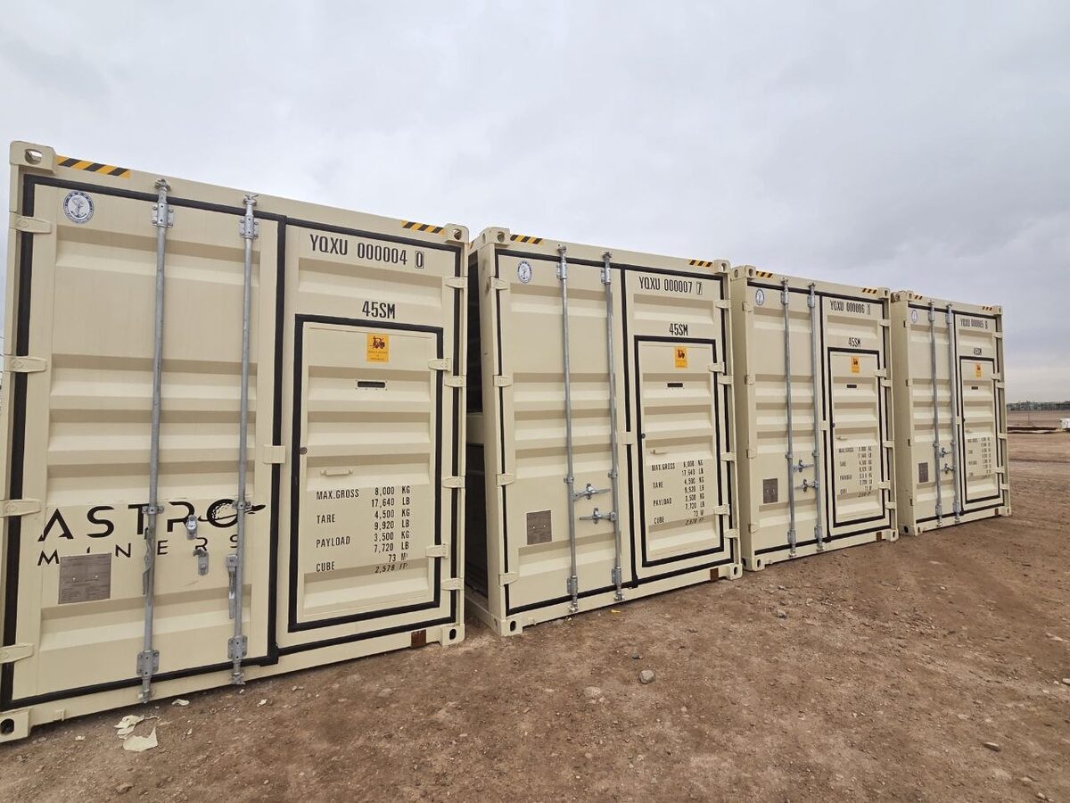 Row of Astro Miners branded mobile testing containers at the Odessa, Texas yard